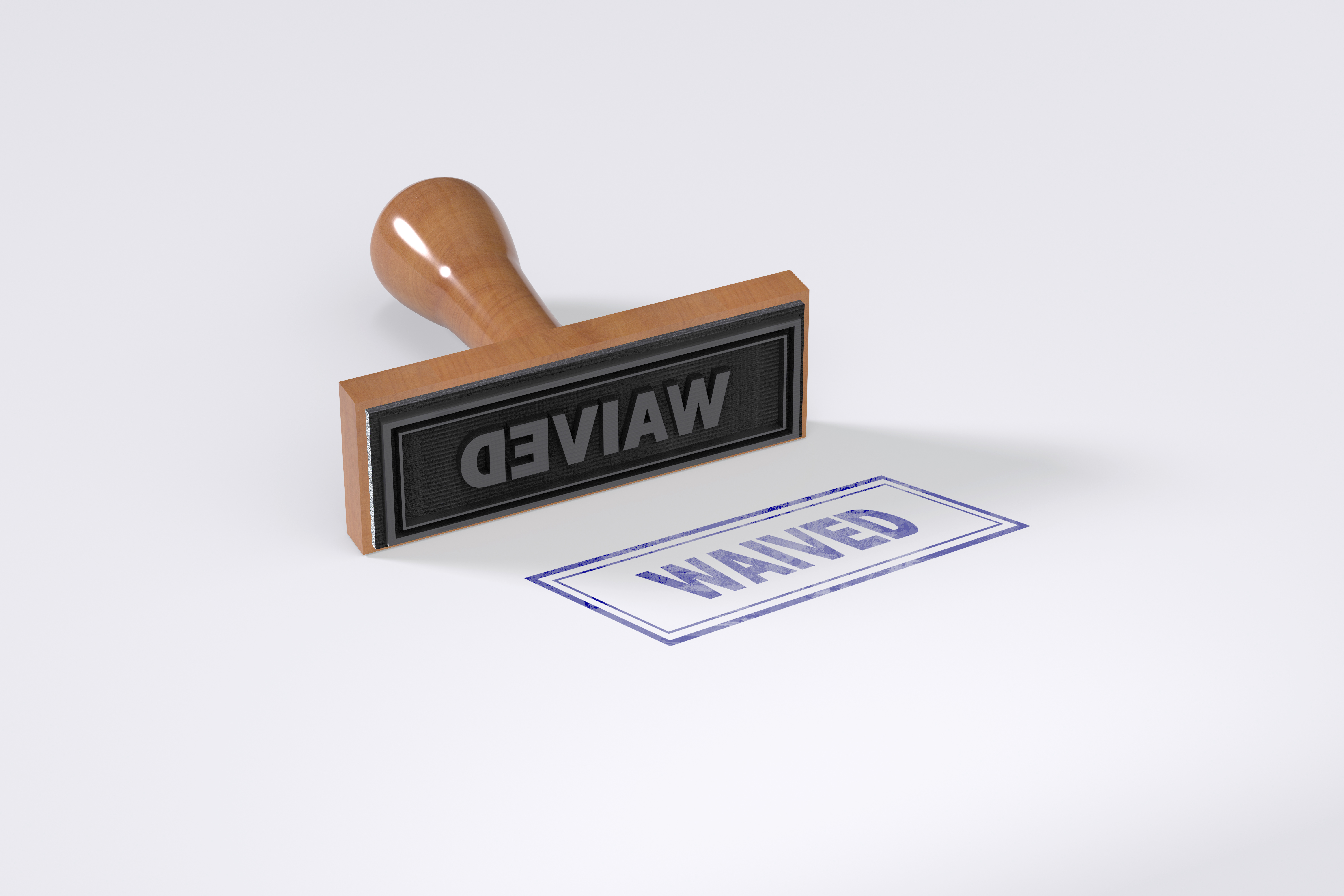 A rubber stamp that says Waived